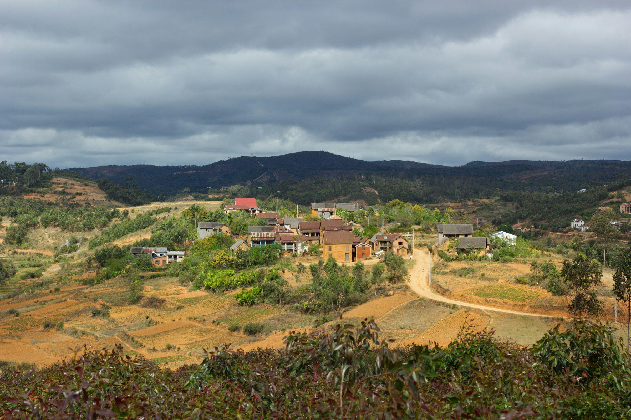 A Highland village among red hills